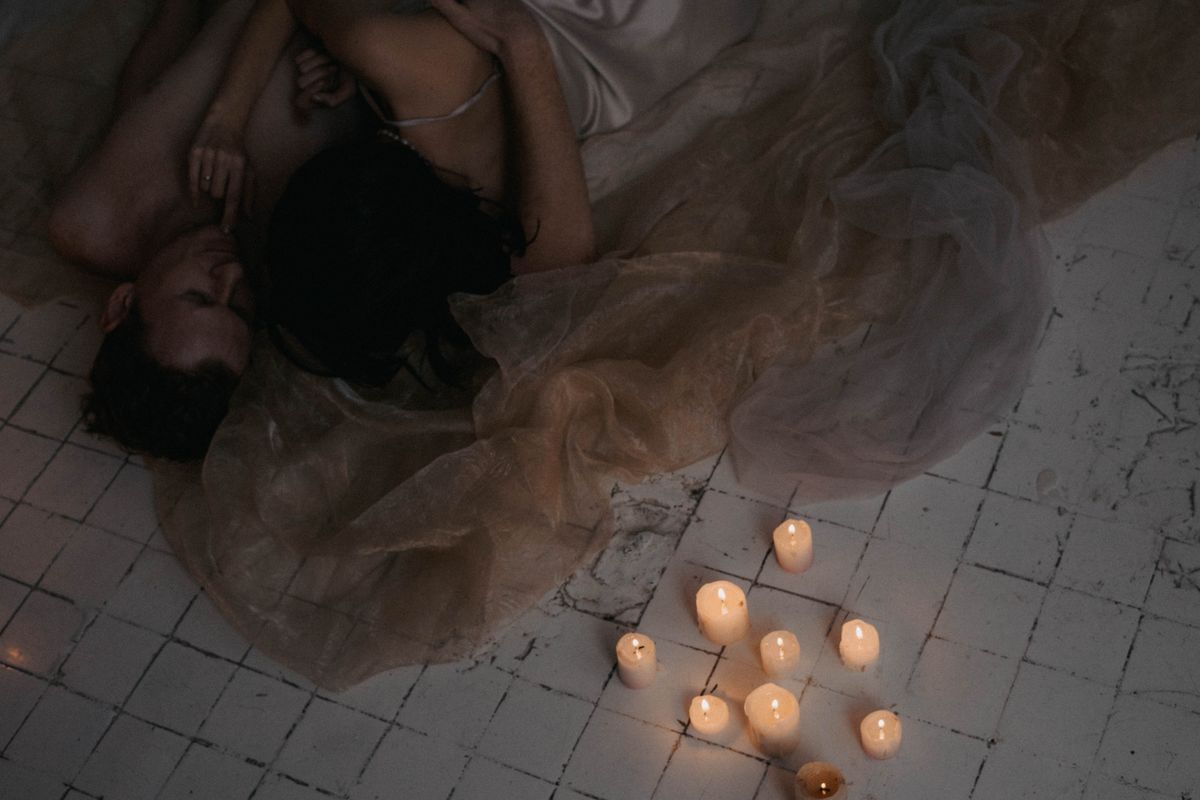 Is Your Nervous System Compatible? The Dating Question UK Couples Are Asking in 2026 3 Couple in warm candlelit intimate embrace