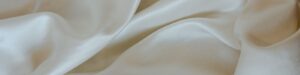 Soft white silk fabric — soft life intimacy wellness