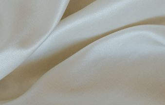Soft white silk fabric — soft life intimacy wellness