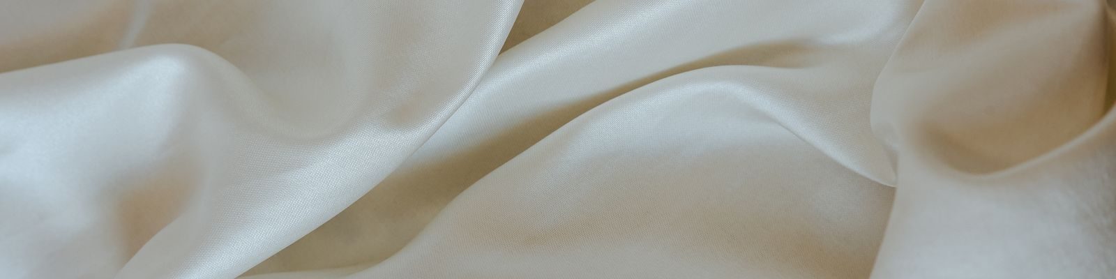Soft white silk fabric — soft life intimacy wellness