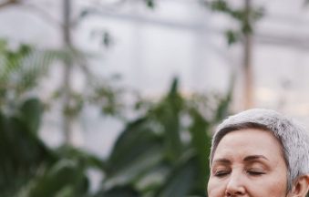 Woman in serene wellness meditation pose — pelvic floor health UK women